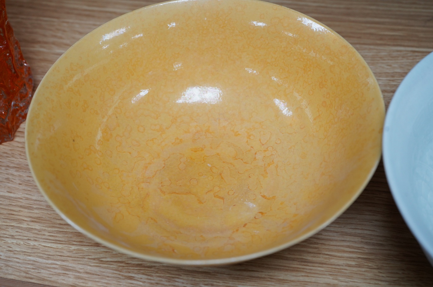 A Chinese celadon bowl and a fine yellow and brown decorated bowl, yellow bowl 9cm diameter. Condition - good